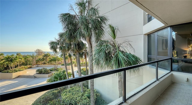 balcony featuring a water view