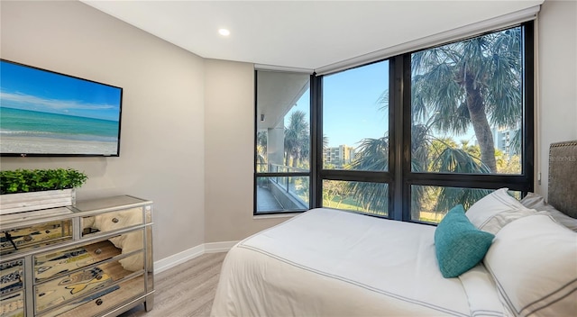 bedroom with light hardwood / wood-style flooring