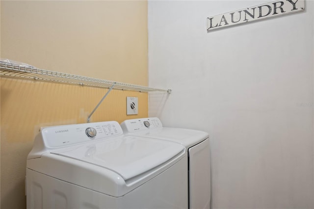 laundry area featuring washer and clothes dryer