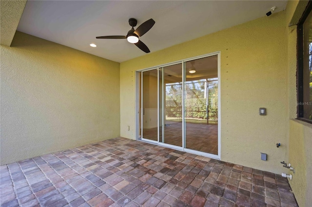 view of patio / terrace featuring ceiling fan