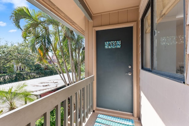 property entrance with a balcony