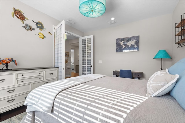 bedroom featuring hardwood / wood-style flooring