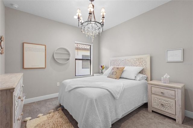 bedroom featuring light colored carpet and a notable chandelier