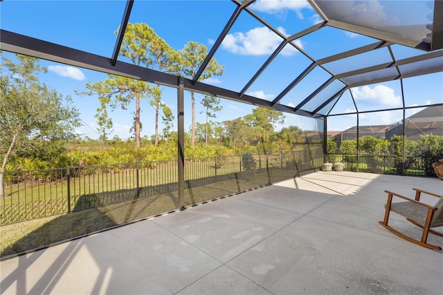 view of patio / terrace with a lanai