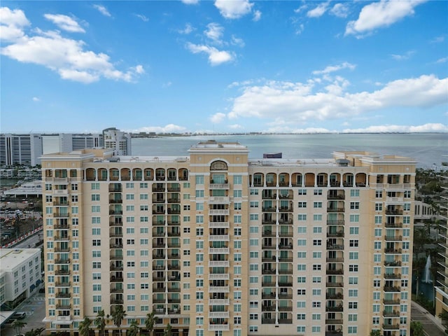 view of building exterior featuring a water view