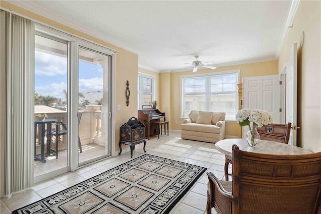 750 N Tamiami Trl Unit 420, Sarasota, FL 34236 - living room with crown molding, ceiling fan, and light tile patterned floors