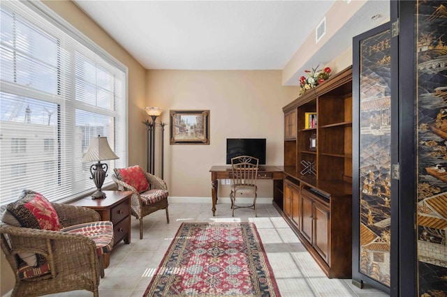 750 N Tamiami Trl Unit 420, Sarasota, FL 34236 - office area featuring light tile patterned floors and baseboards