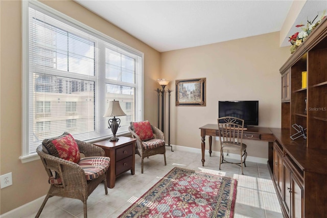 750 N Tamiami Trl Unit 420, Sarasota, FL 34236 - office area featuring baseboards and light tile patterned floors