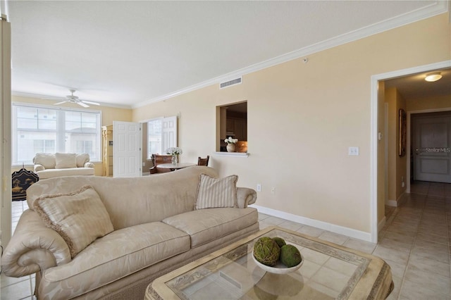 living room featuring ceiling fan, crown molding, and light tile patterned flooring