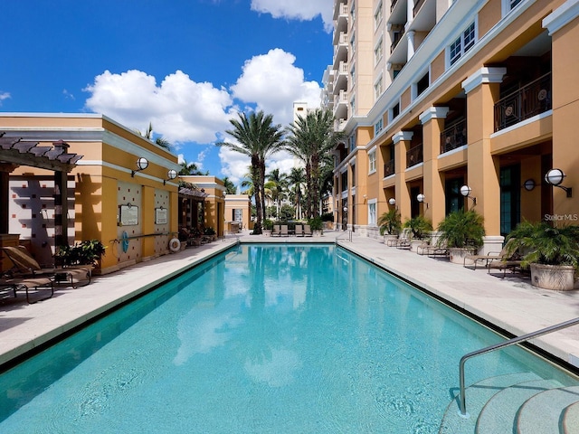 view of pool featuring a pergola