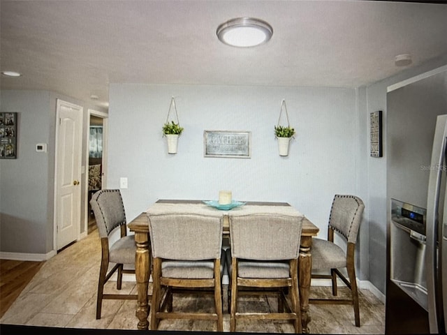 dining area featuring hardwood / wood-style floors