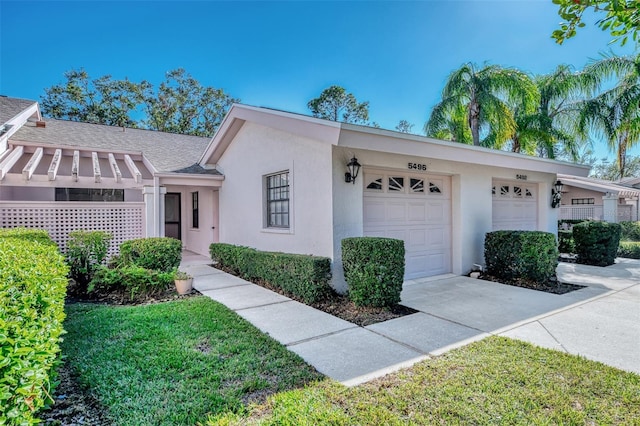 townhome / multi-family property featuring a garage