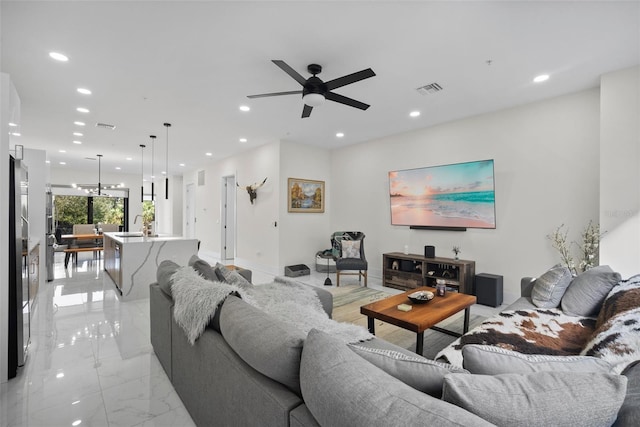 living room featuring ceiling fan