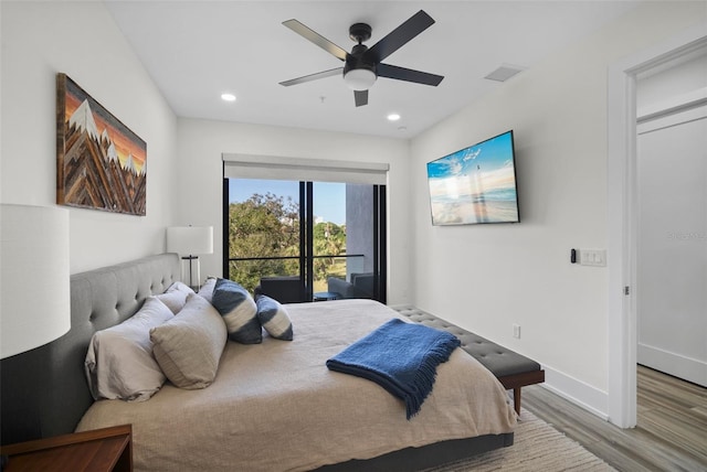 bedroom featuring ceiling fan and wood-type flooring