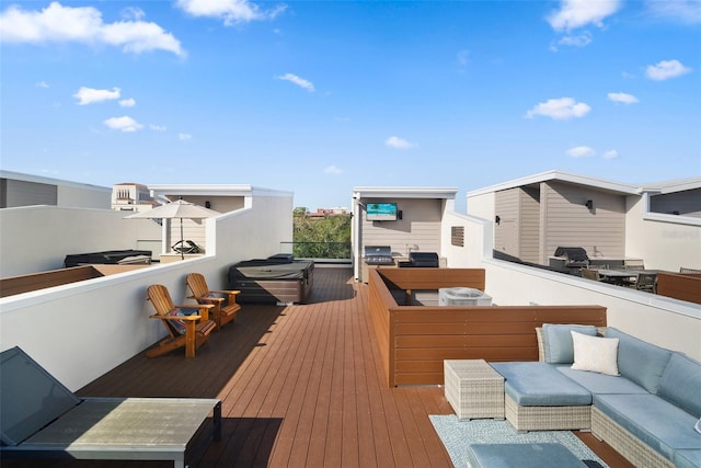 wooden terrace with outdoor lounge area, a grill, and a hot tub