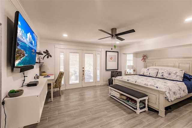 bedroom with ceiling fan, light hardwood / wood-style floors, access to outside, and french doors