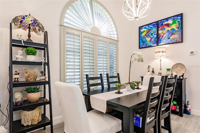 dining room featuring a notable chandelier