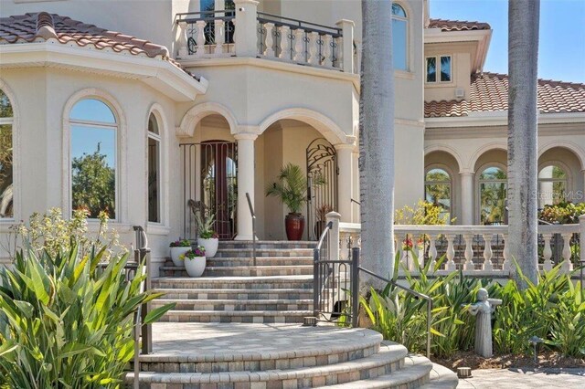 doorway to property with a balcony