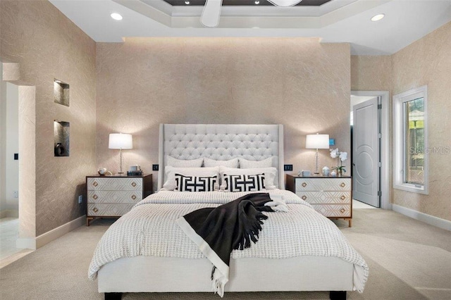 bedroom with light carpet and a towering ceiling