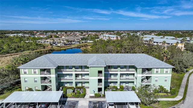 drone / aerial view with a water view