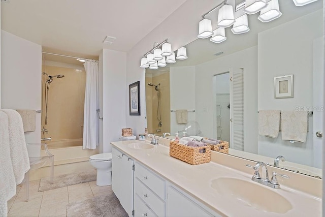 full bathroom with tile patterned flooring, vanity, toilet, and shower / bath combo with shower curtain