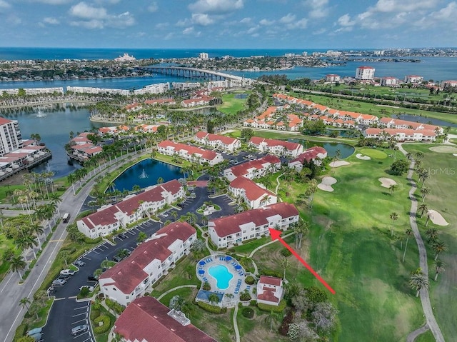 aerial view featuring a water view and golf course view