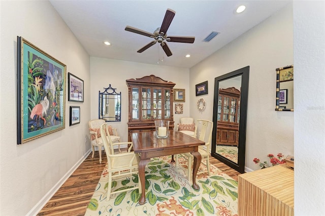 home office featuring ceiling fan and hardwood / wood-style flooring