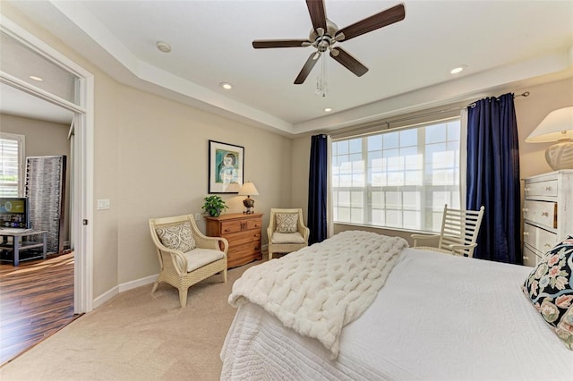 bedroom featuring ceiling fan and hardwood / wood-style flooring