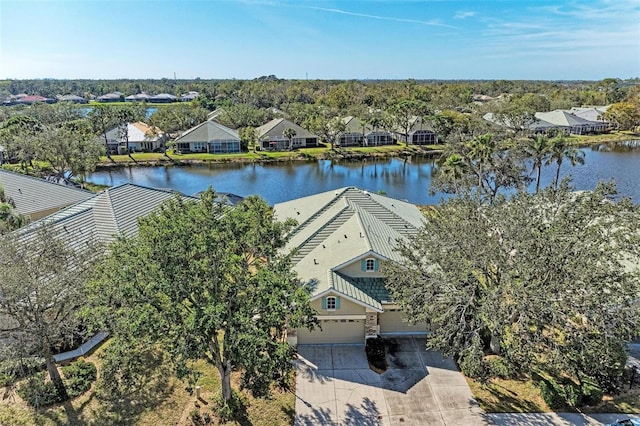 drone / aerial view featuring a water view