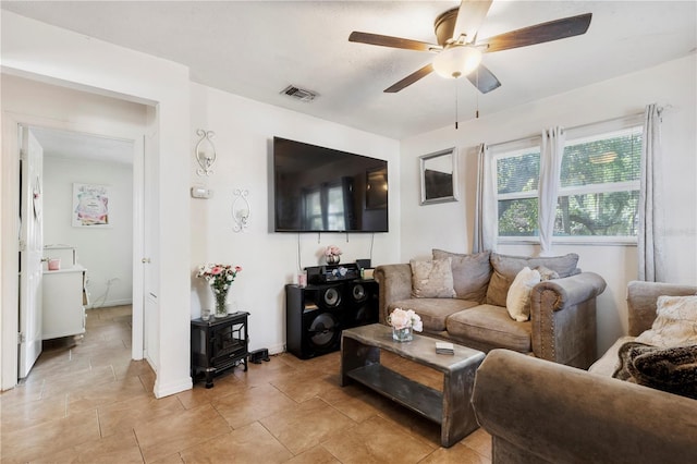 living room featuring ceiling fan