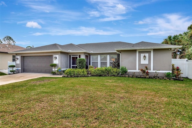 single story home with a garage and a front yard