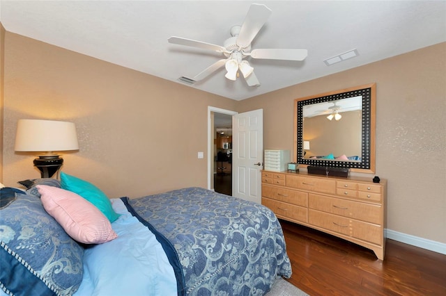 bedroom featuring dark wood-type flooring and ceiling fan