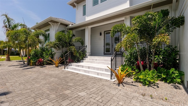 doorway to property featuring a porch