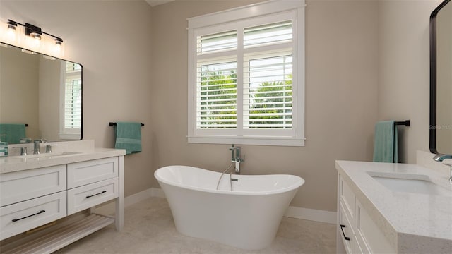 bathroom with a bathtub and vanity