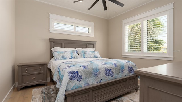 bedroom featuring ceiling fan and light wood-type flooring