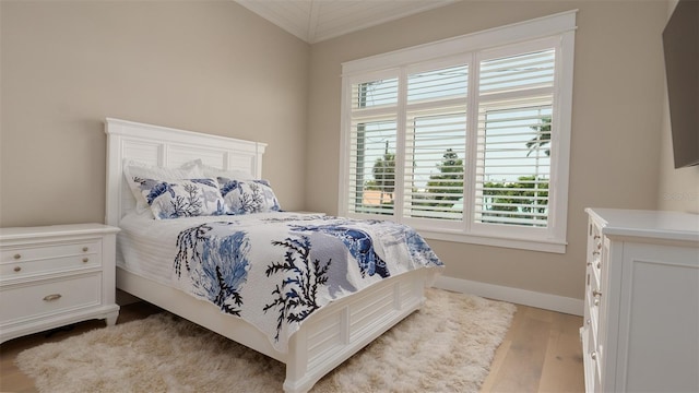 bedroom featuring light hardwood / wood-style floors