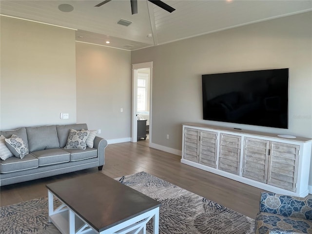 living room with hardwood / wood-style floors and ceiling fan