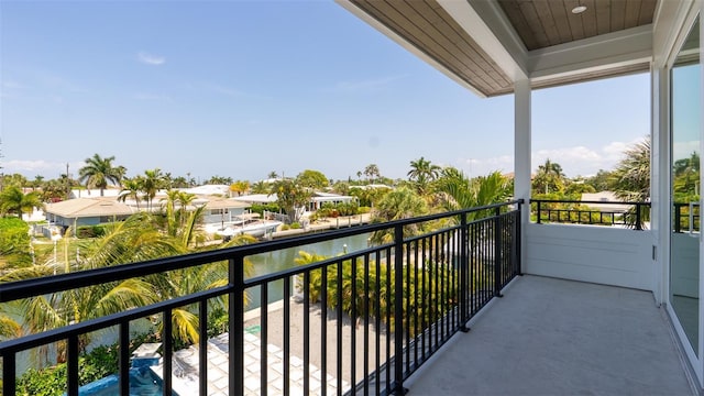 balcony featuring a water view