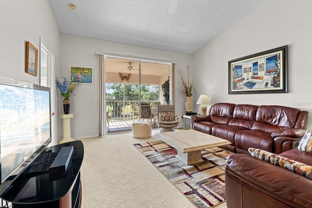 living room featuring carpet, a textured ceiling, and vaulted ceiling