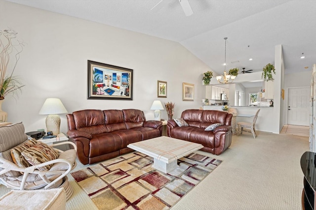 living room with light carpet, ceiling fan, and lofted ceiling