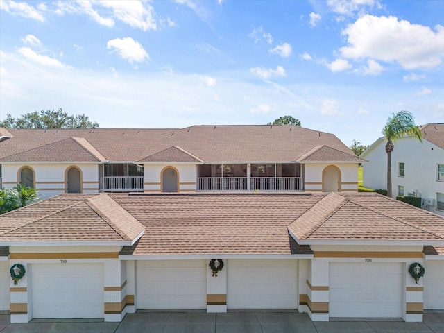 view of front of home featuring a balcony