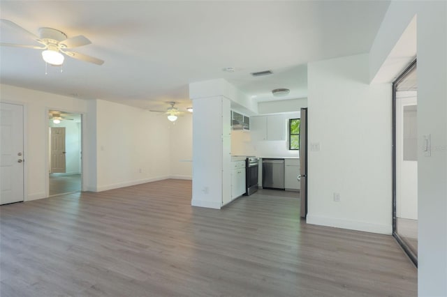 unfurnished living room with light wood-type flooring