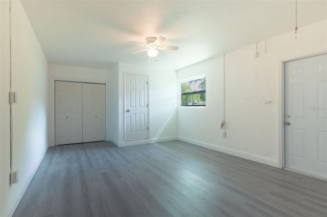 unfurnished bedroom with wood-type flooring and ceiling fan