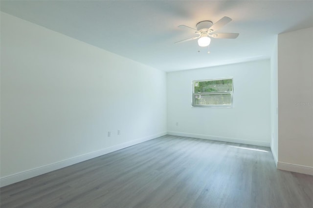 unfurnished room featuring wood-type flooring and ceiling fan