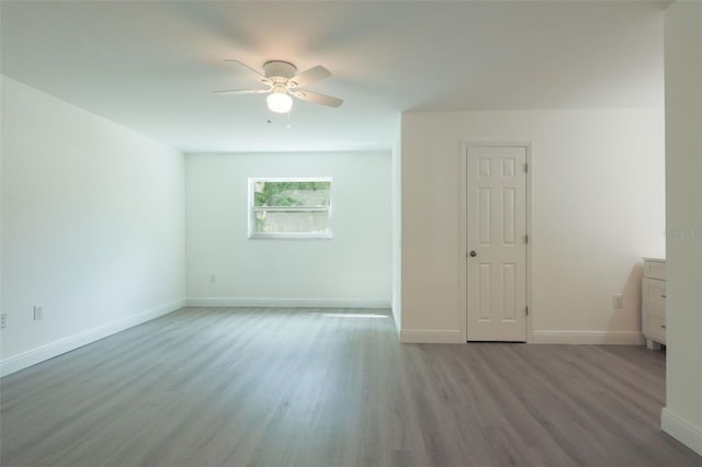 unfurnished room with ceiling fan and light hardwood / wood-style flooring