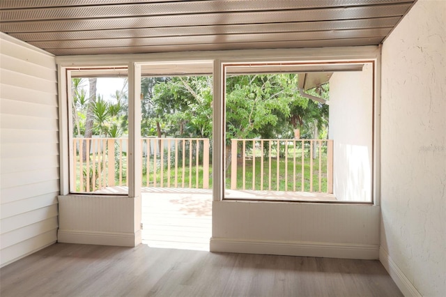 doorway to outside featuring light wood-type flooring