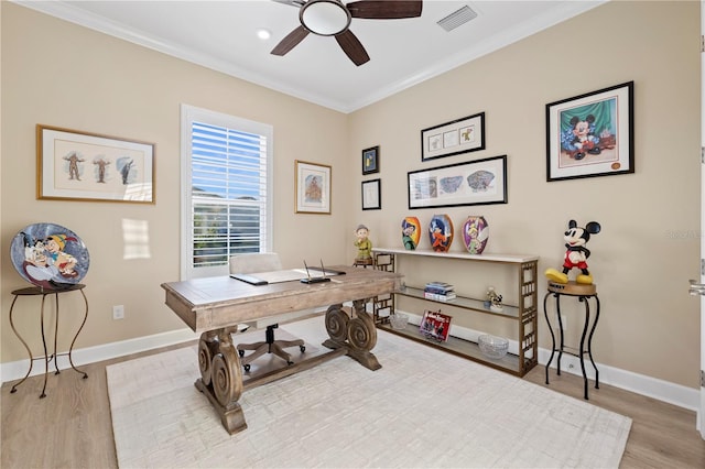 office area with crown molding, ceiling fan, and light hardwood / wood-style flooring