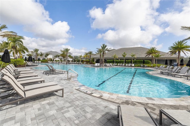 view of swimming pool with a patio