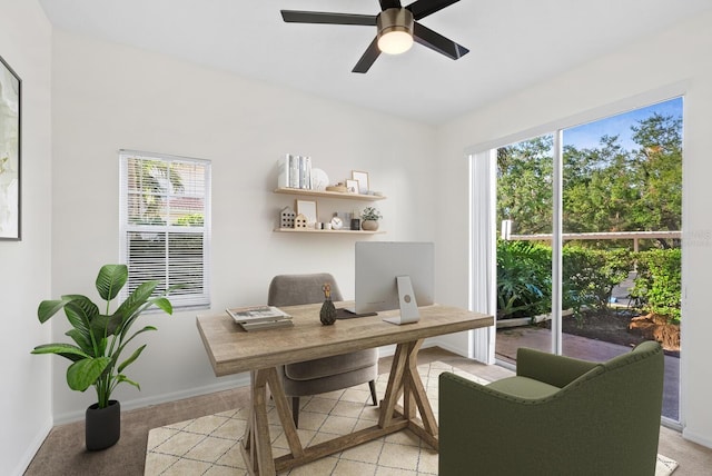 office area featuring ceiling fan and plenty of natural light