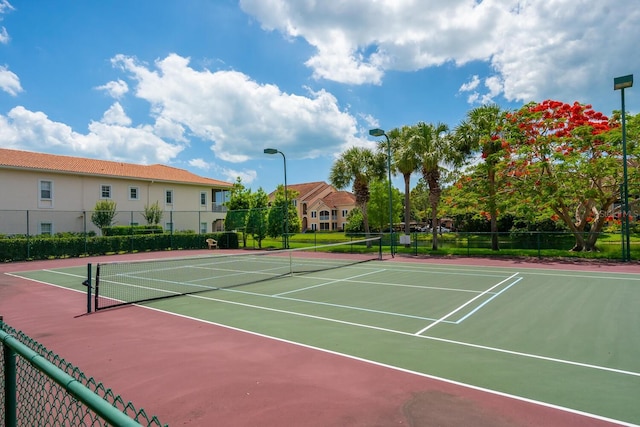 view of tennis court with basketball court